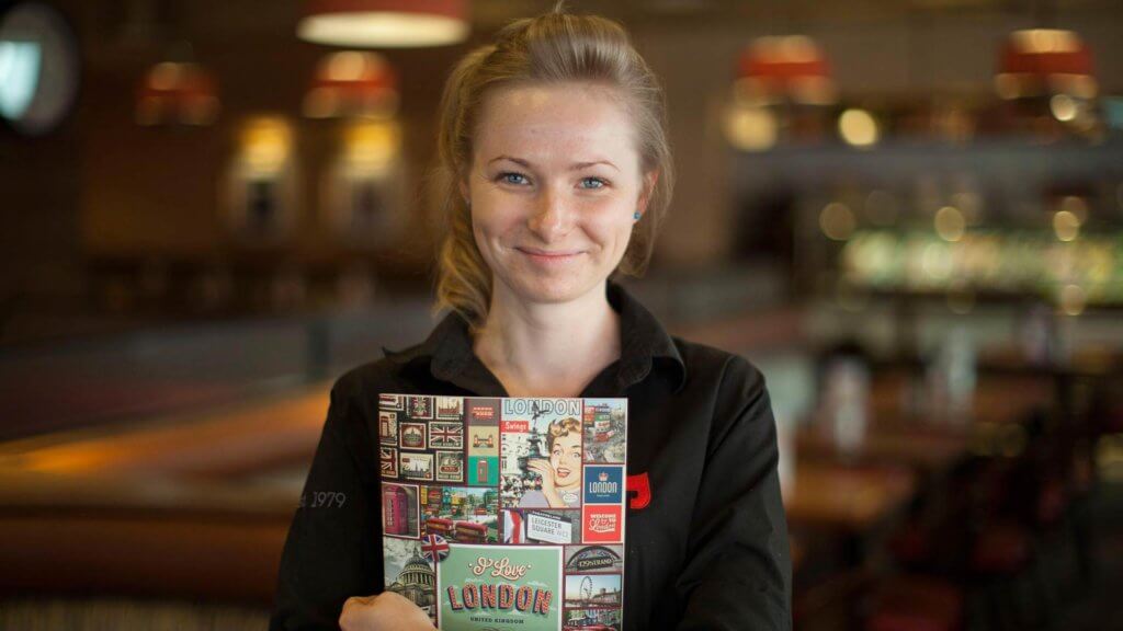 garfunkels waitress holding menu